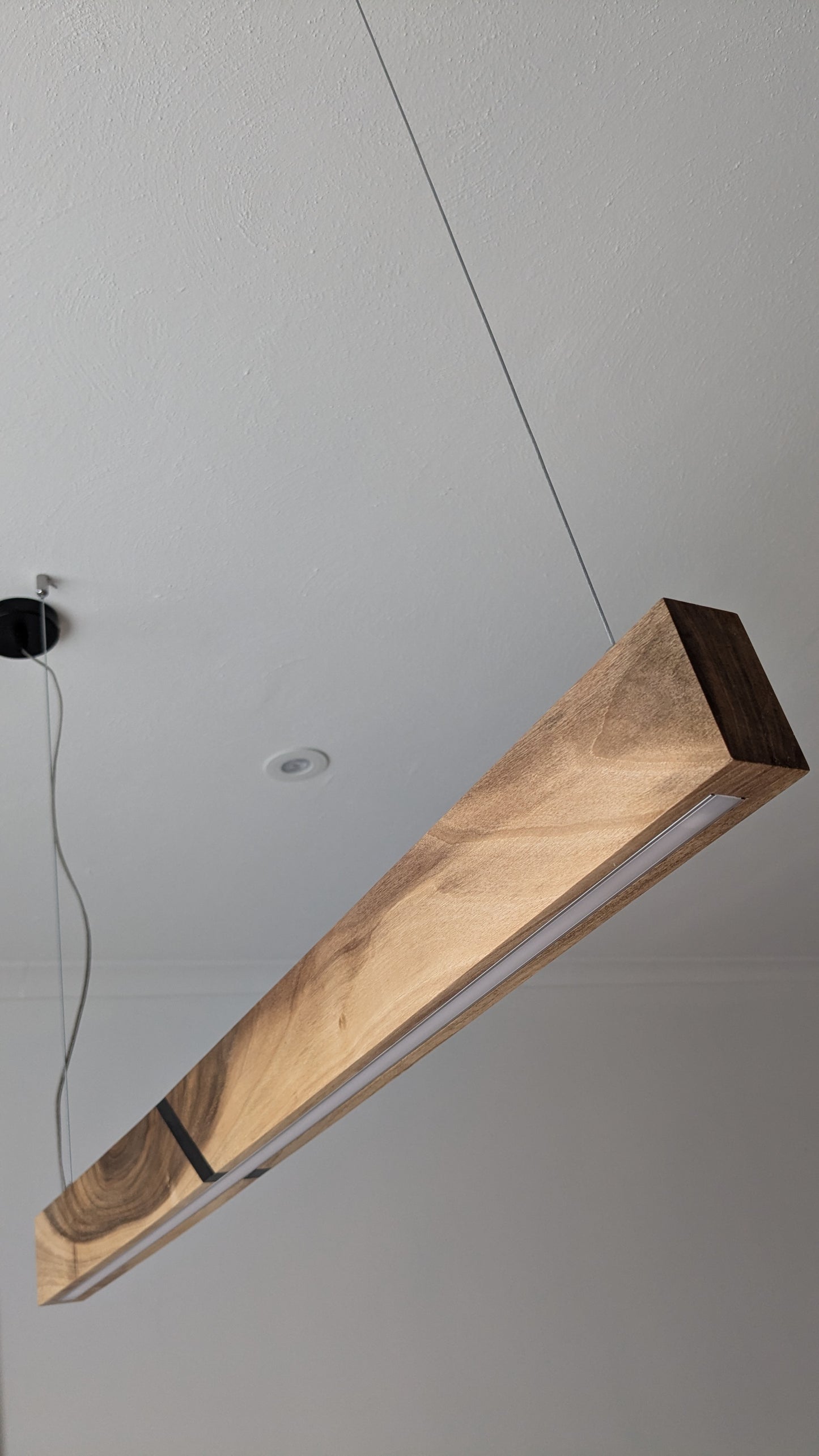Linear LED Pendant Light | Italian Walnut with Black Resin on a glossy finish