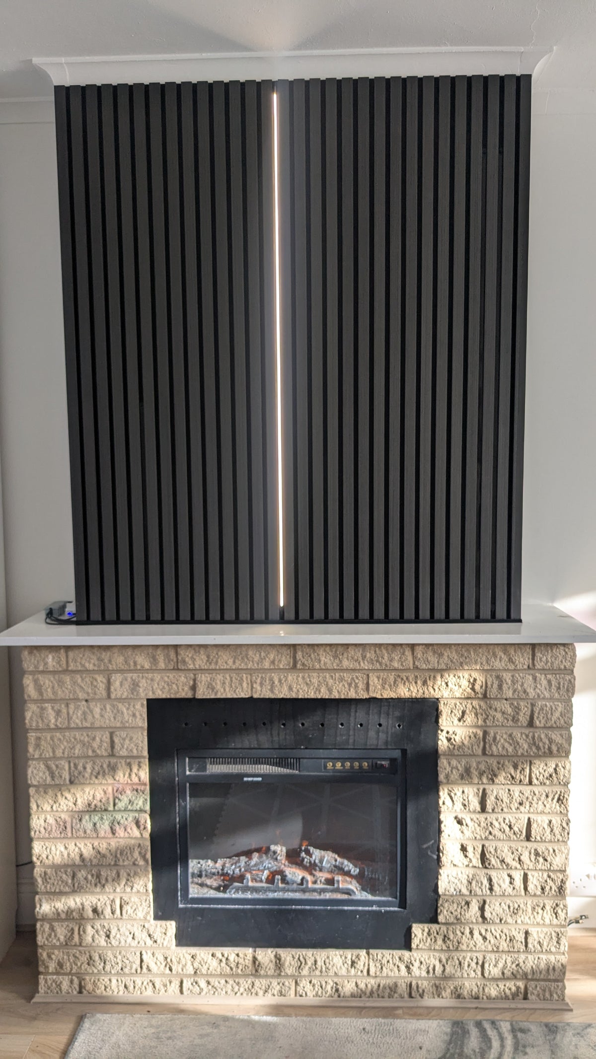 Invisible by day, bright by night: LED light for slatted acoustic wall panels
