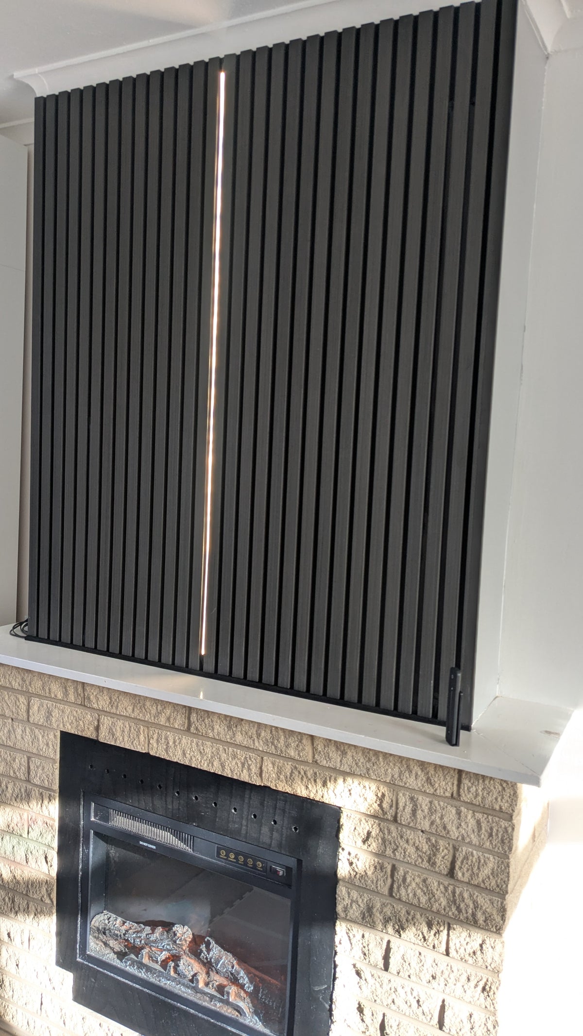 Discreet LED lighting for an acoustic panel feature wall, plug in or fused spur connection