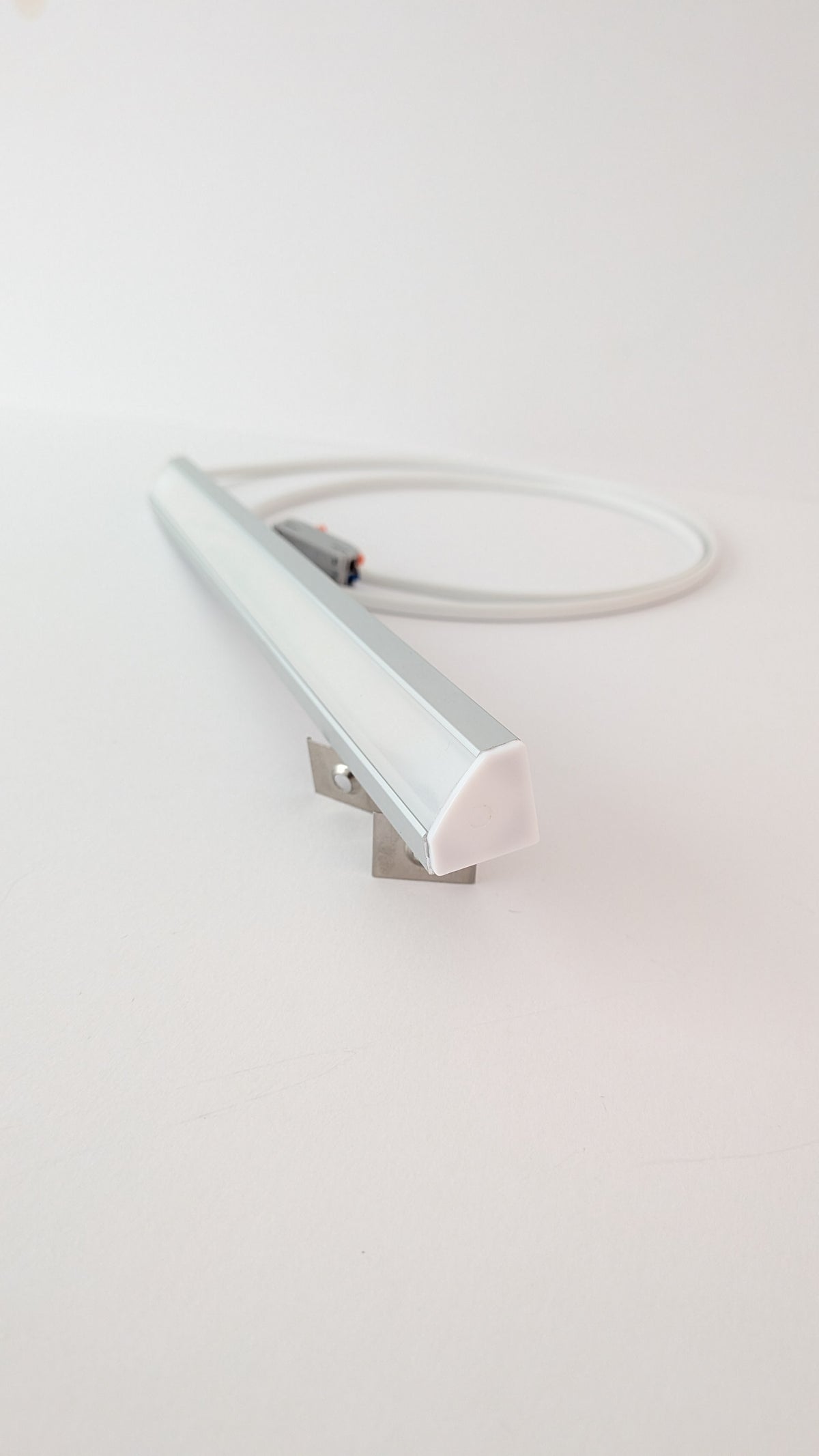 Ultra-slim 19mm corner LED strip light giving dotless, even light under a wall cabinet