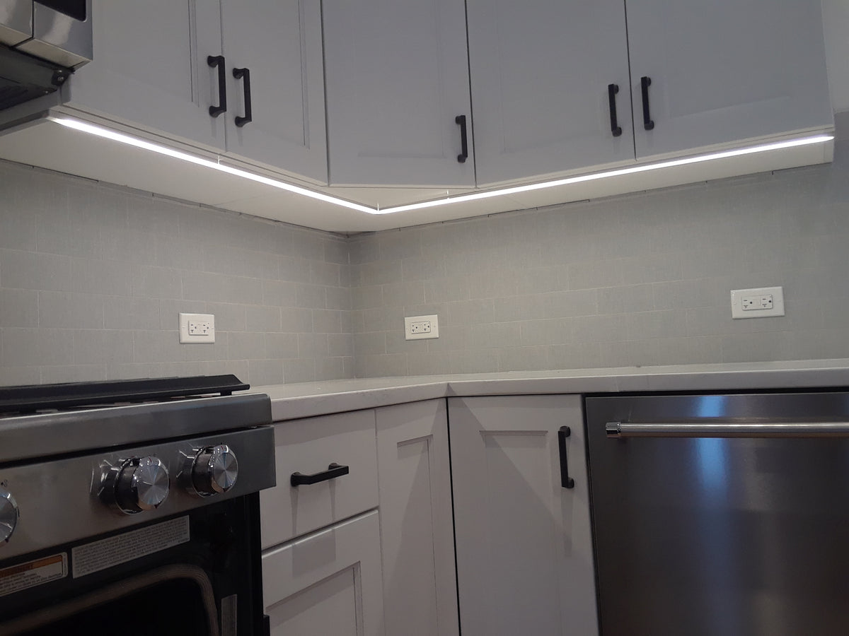 7mm slim LED strip fitted under a kitchen wall cabinet